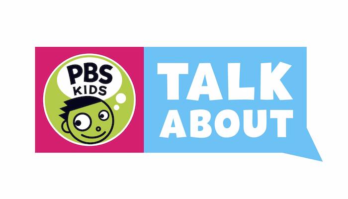 The PBS Kids logo in green, black, and white, on a rectangular word balloon field with pink behind the logo and "talk about" in white on light blue next to it