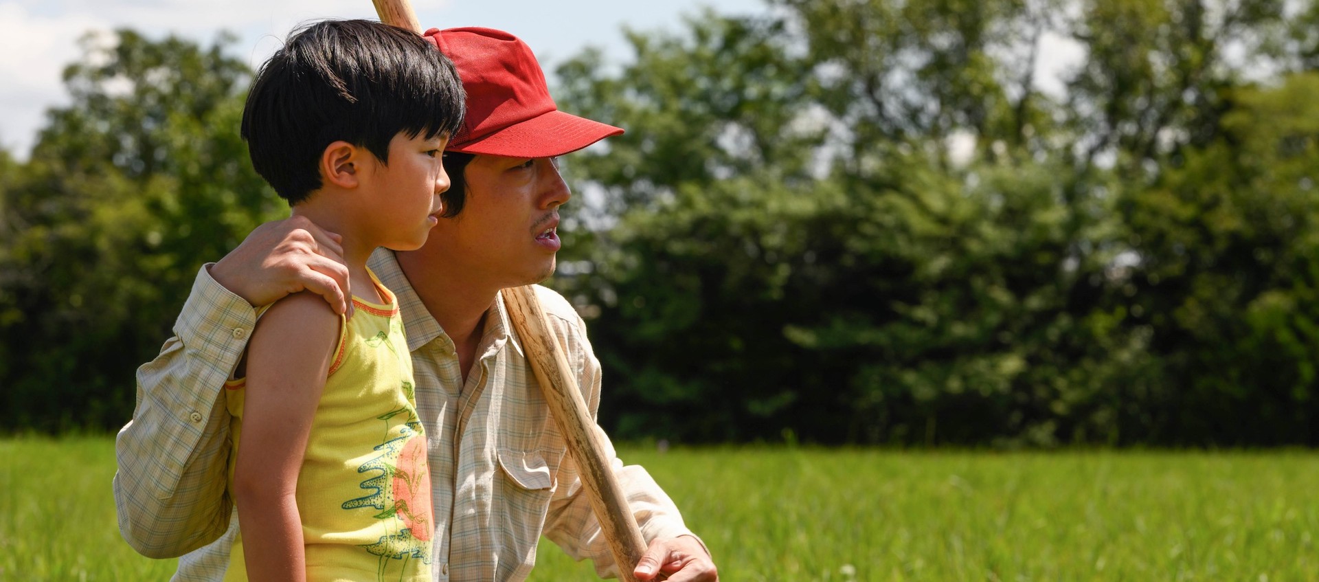 Alan S. Kim and Steven Yeun in a scene from the film Minari