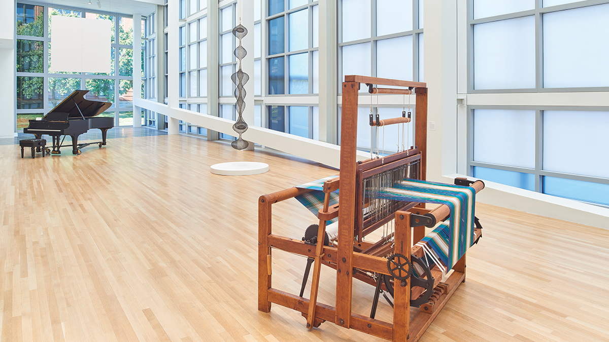 Large loom, a Ruth Asawa wire sculpture, and piano in the Wexner Center galleries