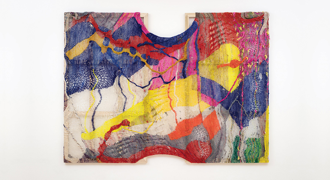 image of colorful hanging fiber art