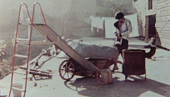 Wheelbarrow sitting in front of slide