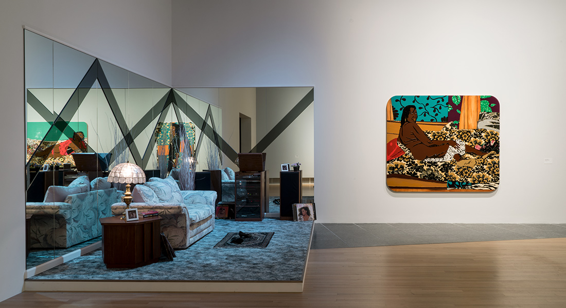 An installation shot of artwork by Mickalene Thomas, inspired by her mother Sandra "Mama" Bush, as seen in the Wexner Center for the Arts Fall 2018 exhibition Mickalene Thomas: I Can't See You Without Me