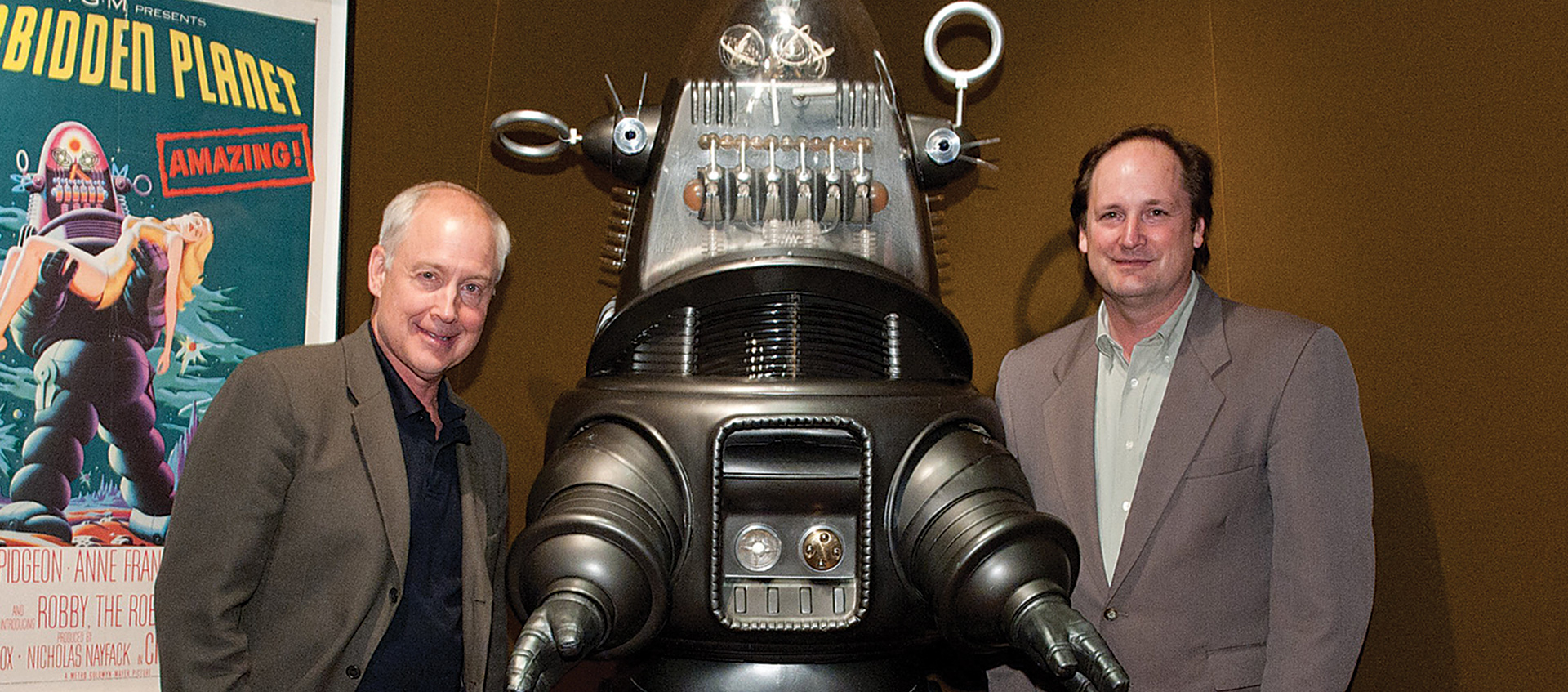 Craig Barron and Ben Burtt standing with robot