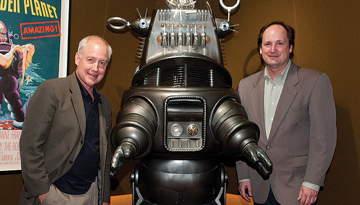 Craig Barron and Ben Burtt standing with robot