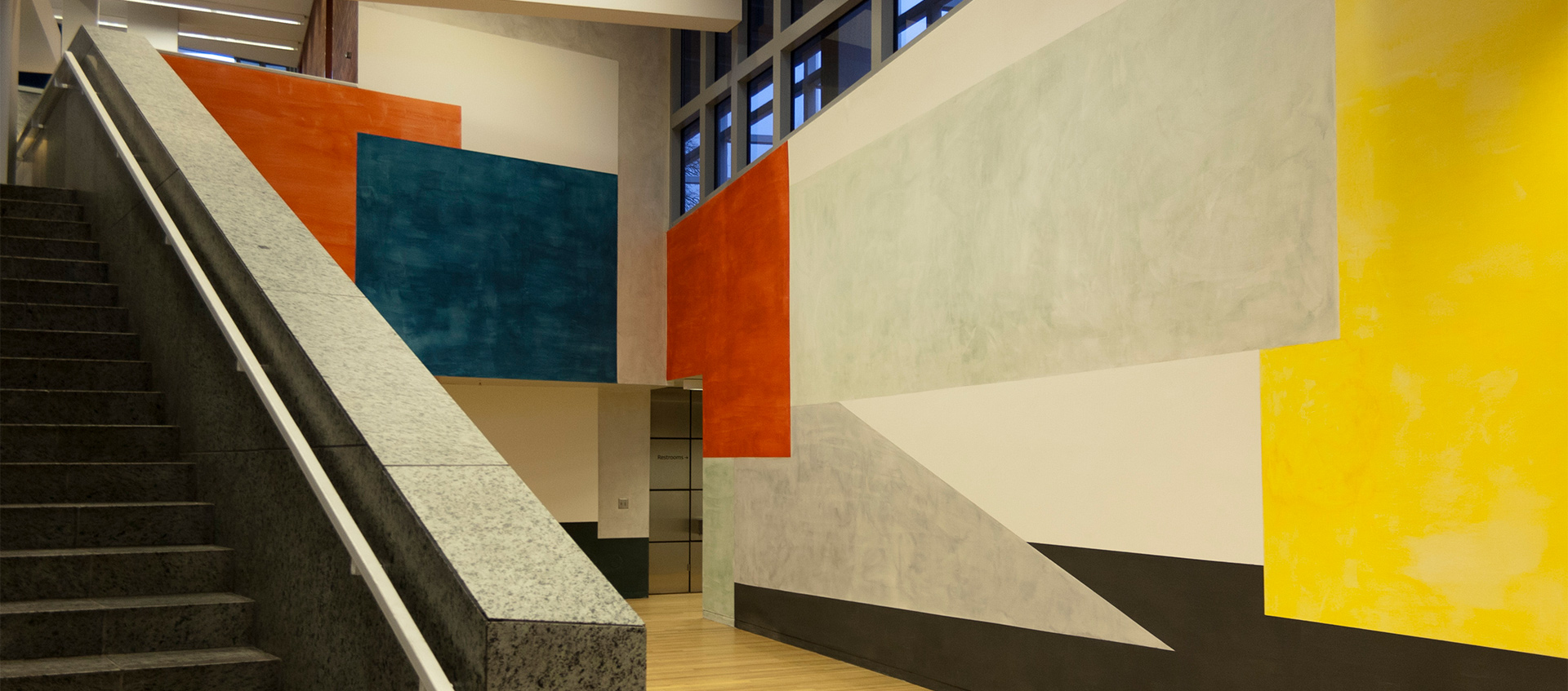 The walls of the Wex lobby painted in geometric color