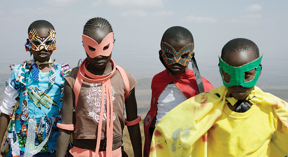 Children dressed in superhero masks and capes