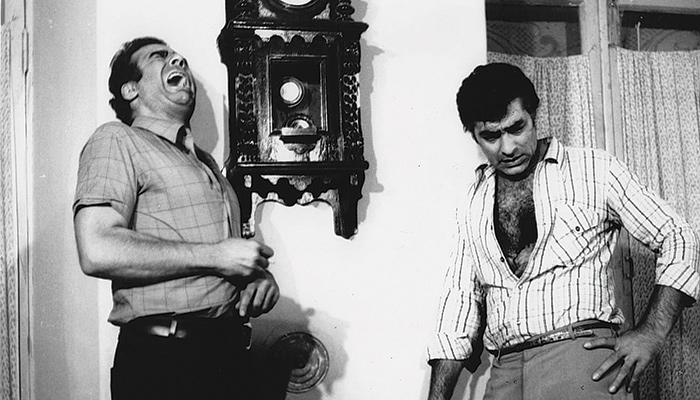 A black and white image of two men from the documentary Filmfarsi