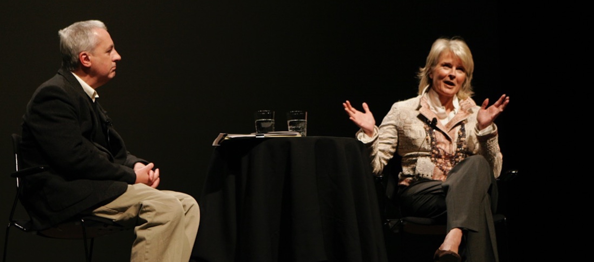 Wexner Center for the Arts curator Bill Horrigan faces actress Candace Bergen during a discussion on stage at Mershon Auditorium 