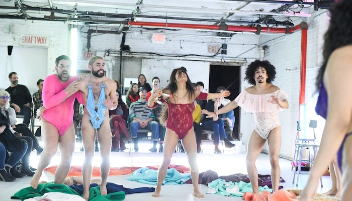 A performance still of theater artist Miguel Gutierrez and his company during the performance work This Bridge Called My Ass