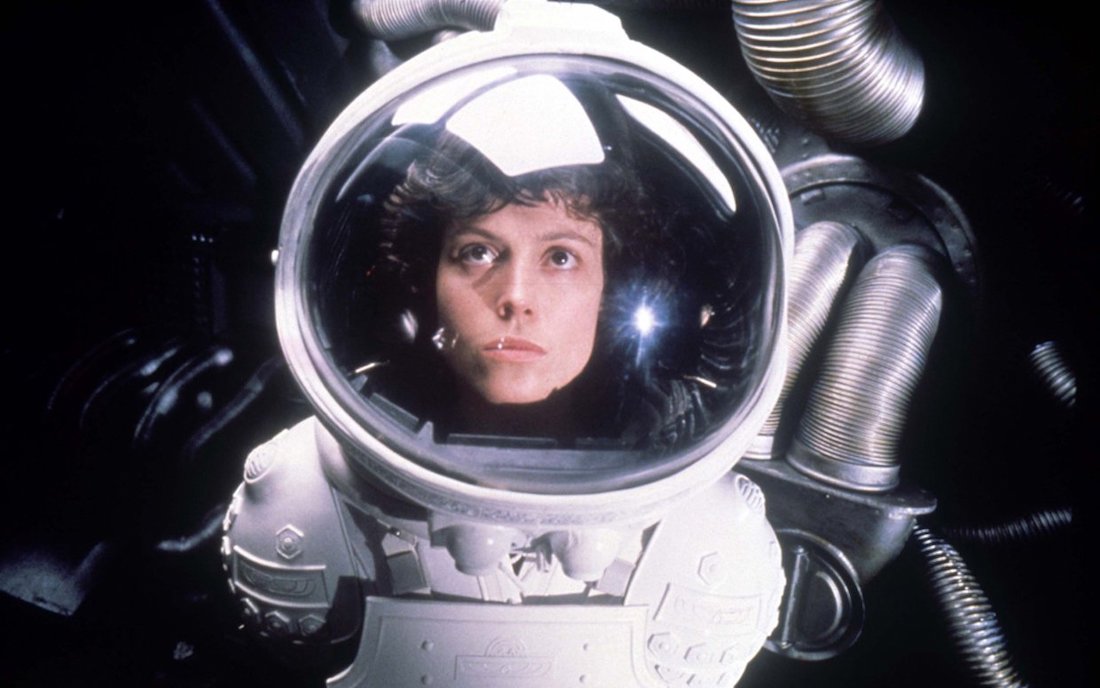 Sigourney Weaver wearing a space suit in a scene from Ridley Scott's film Alien