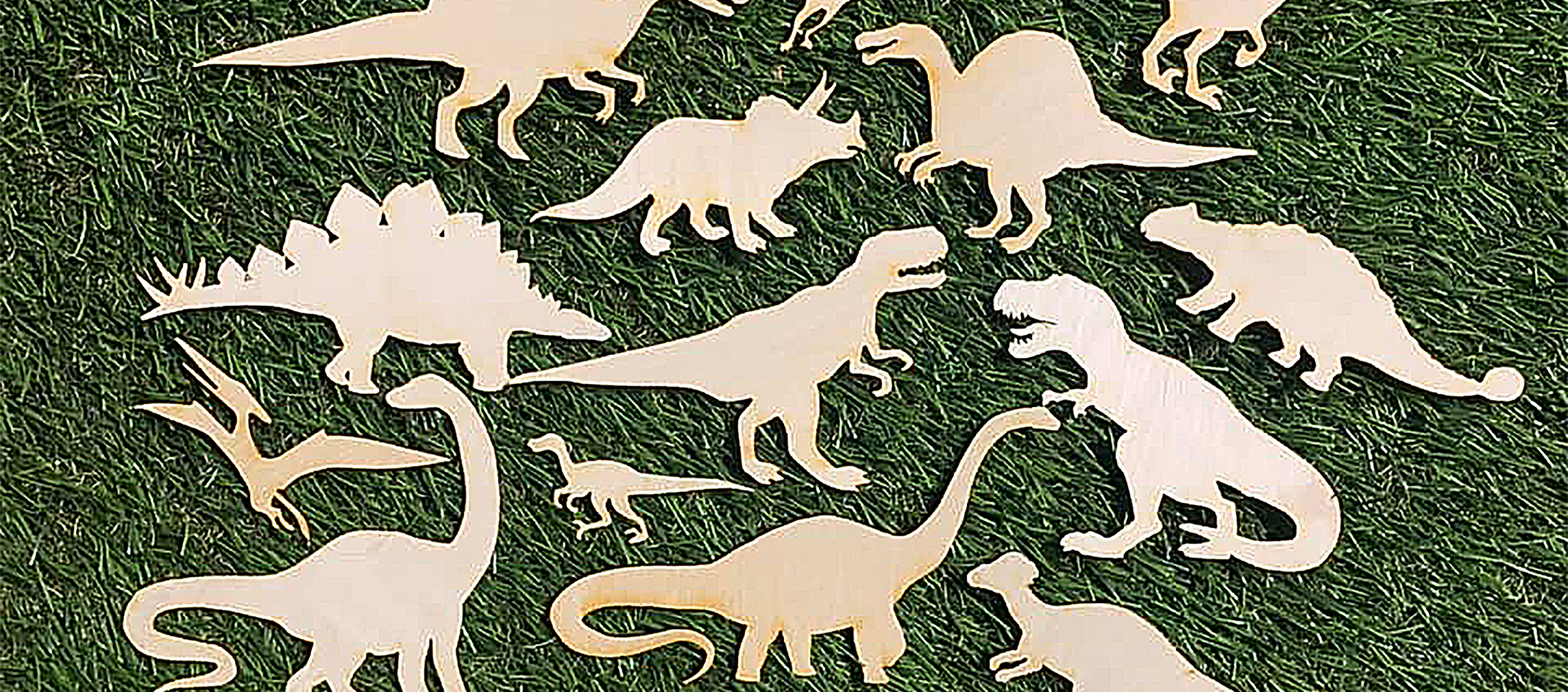 Wooden dinosaur cutouts for painting from Columbus' Griffen Hollow Studios