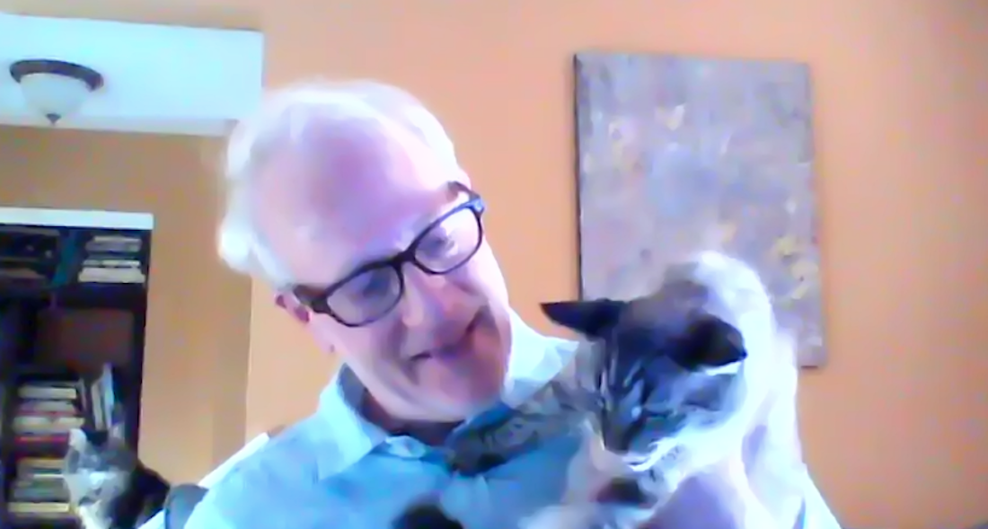 Linus the cat with human Kevin Hathaway, Wexner Center for the Arts Senior Accountant