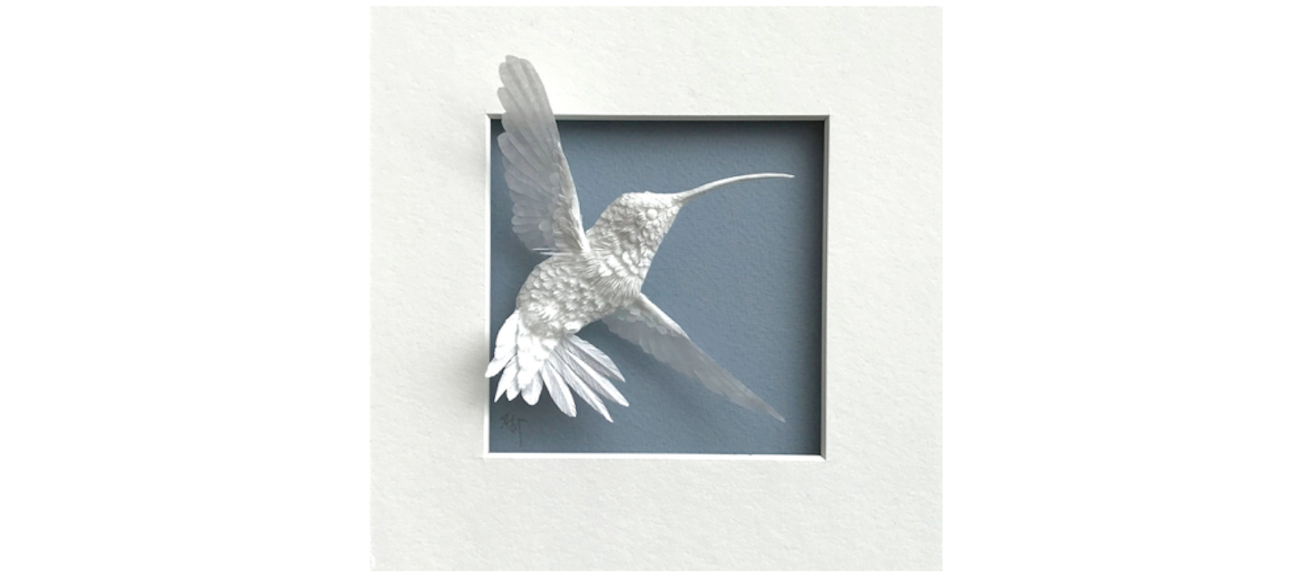 Matted white paper hummingbird sculpture by Columbus, Ohio artist Cheoh-Ah Hwang