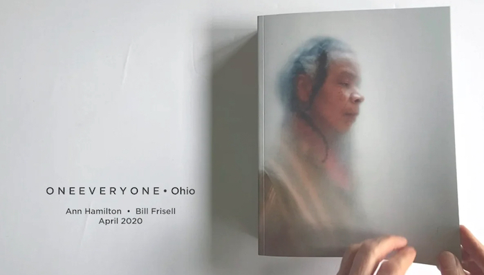 Opening image from the video of artist Ann Hamilton's ONEEVERYONE book. Dancer Bebe Miller is seen on the cover.