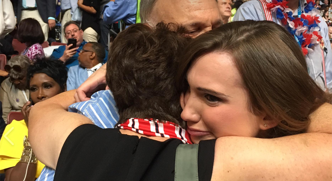 The McBride family embraces amid the 2016 Democratic National Convention.