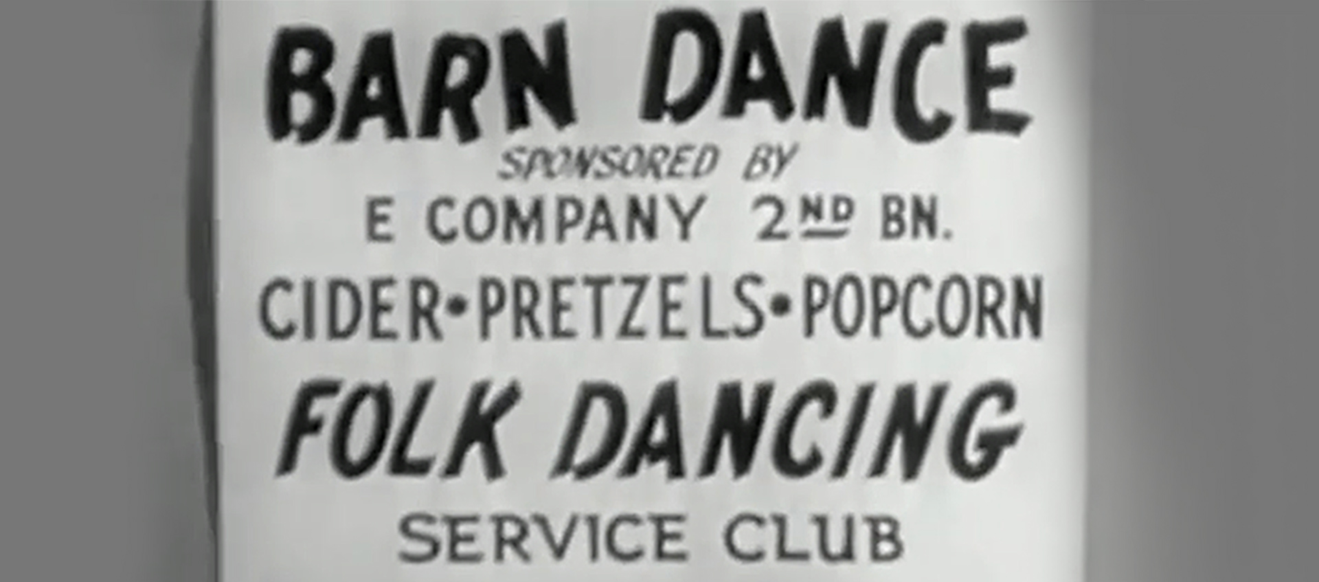 vintage film image of a sign for a barn dance