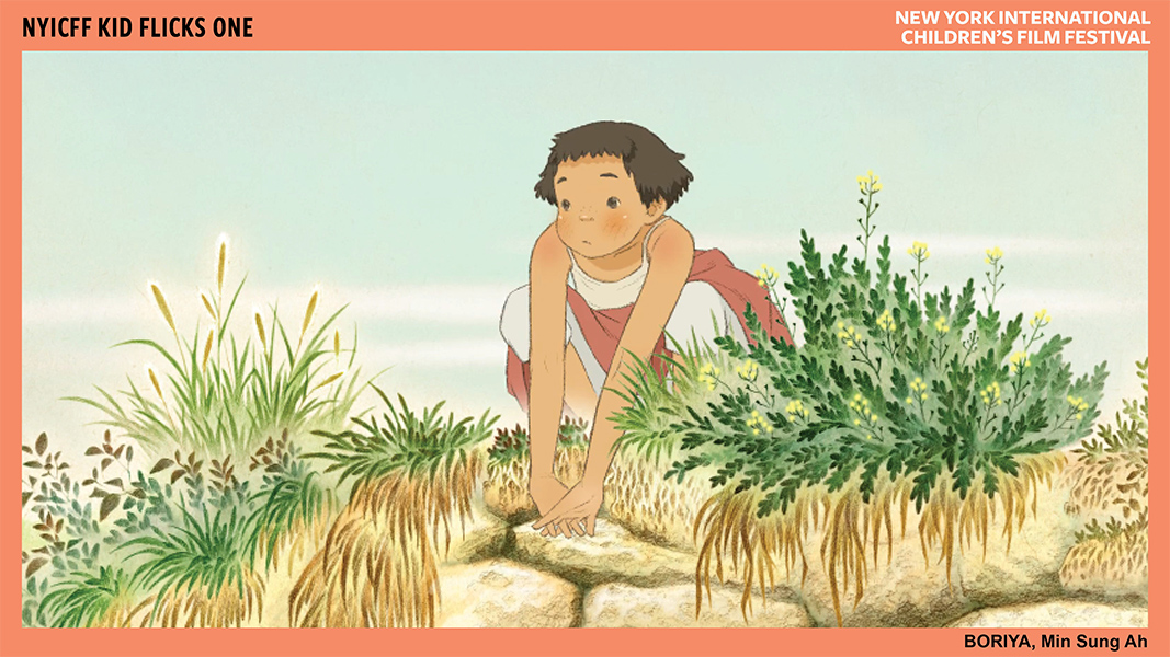 An animated child with short dark hair sits crouched on a rock wall overgrown with plants.