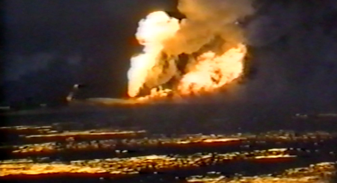 A still from Monira Al Qadiri's Behind the Sun featuring a view of burning oil fields in Kuwait circa 1991