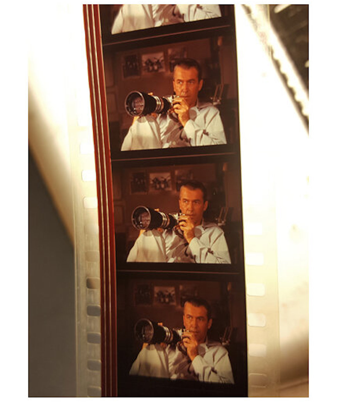 Photo of a strip of 35mm film from a print of Hitchcock's Rear Window; photo by Rachael Barbash