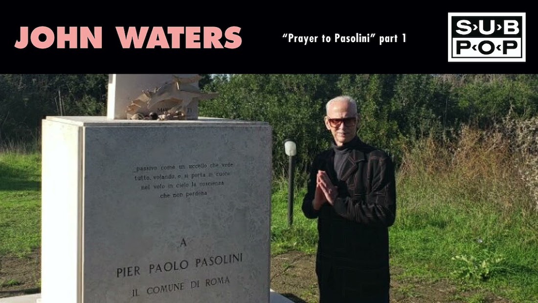 Cover art for John Waters' 7-inch single, with photo of Waters standing next to the gravestone of Pier Paolo Pasolini