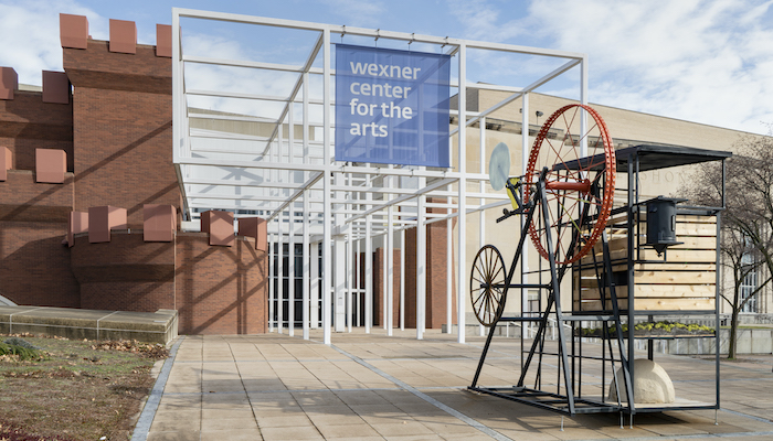 Exterior view of the Wexner Center of the Arts with installations by Chris Burden and Danielle Julian Norton