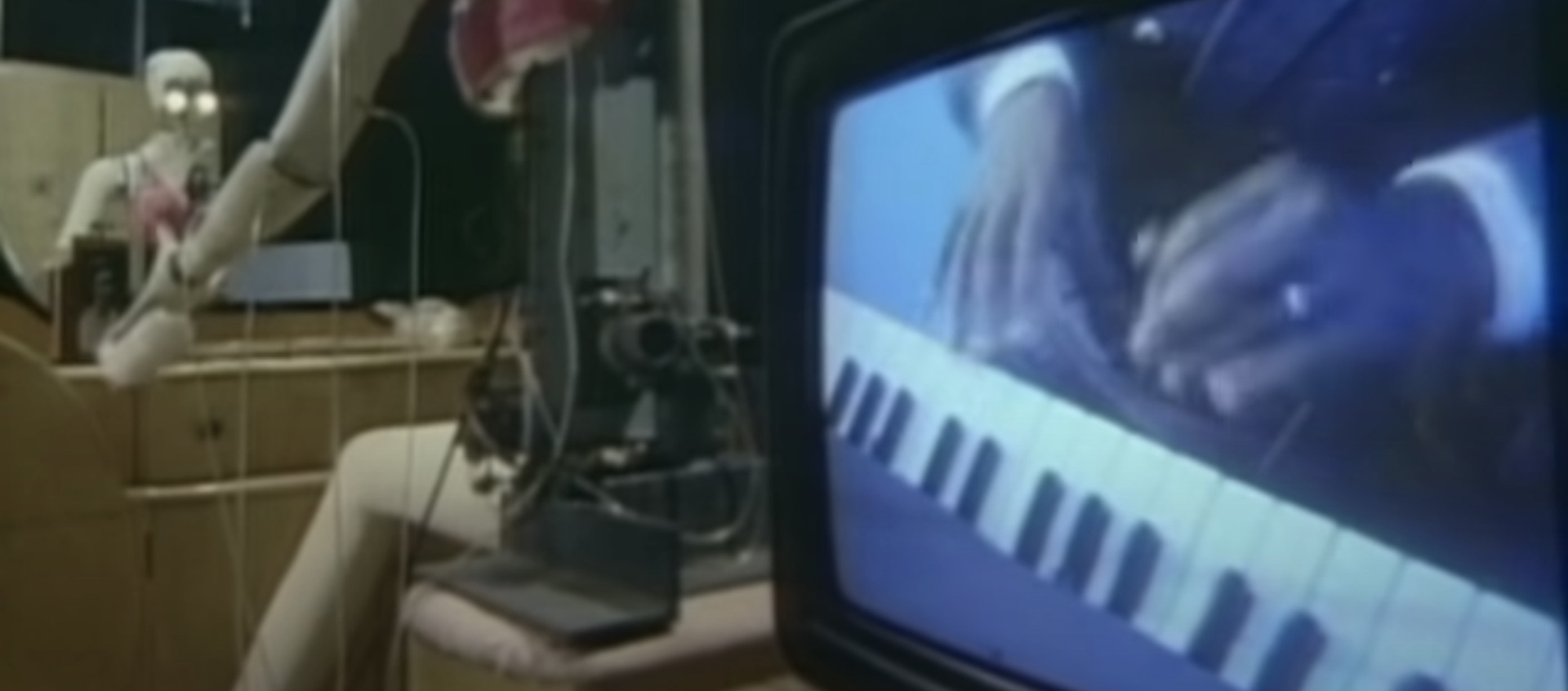 Still from Godley & Creme's music video for Herbie Hancock's "Rockit"