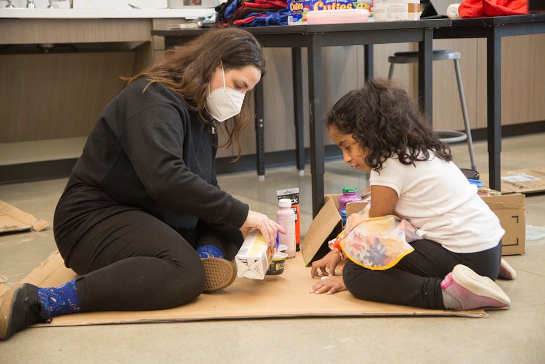 Tala Kanani works with a student at Linden Community Center