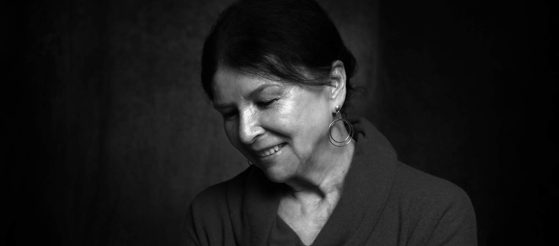 A black and white photograph of Alanis Obomsawin