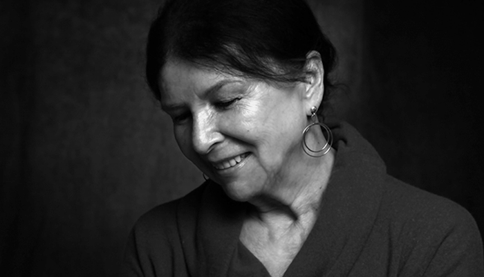 A black and white photograph of Alanis Obomsawin