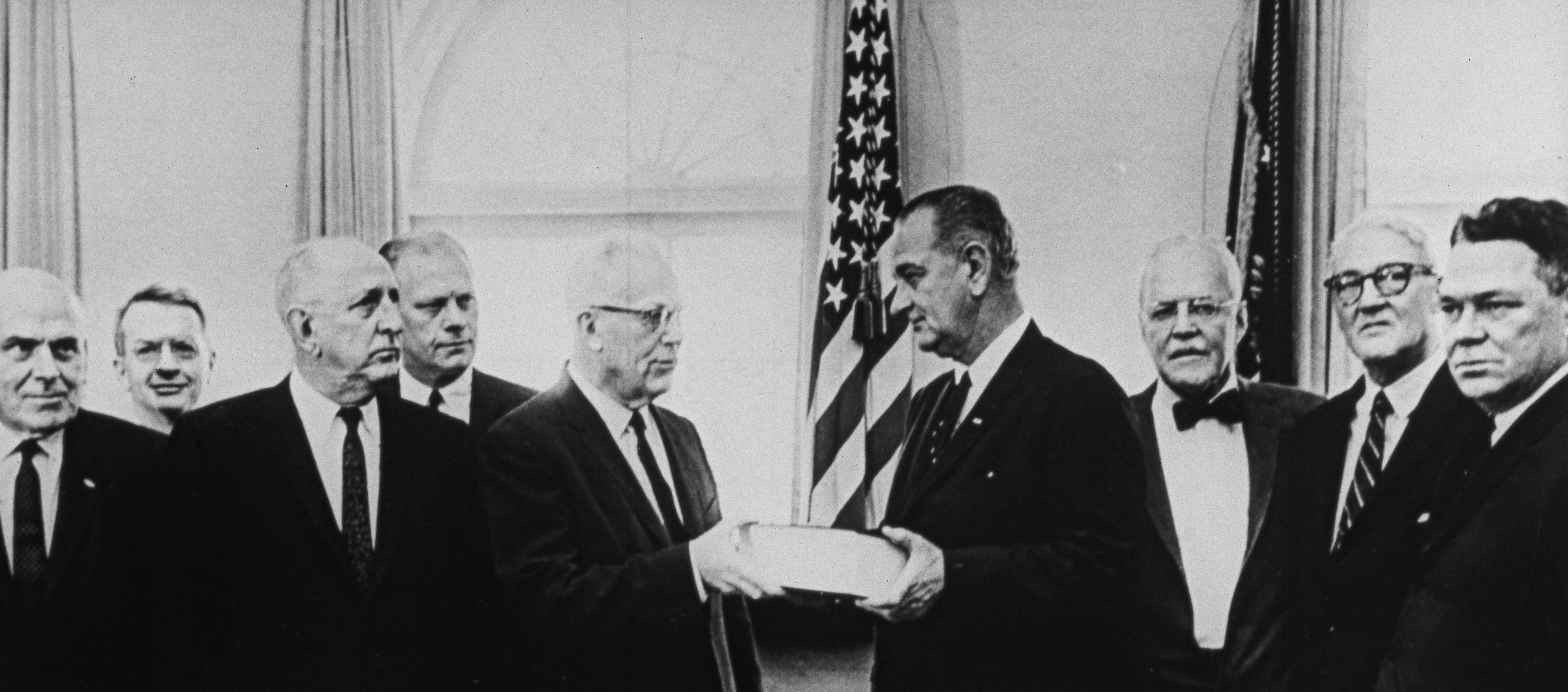 A photograph of the Warren Commission, with President Lyndon Johnson.