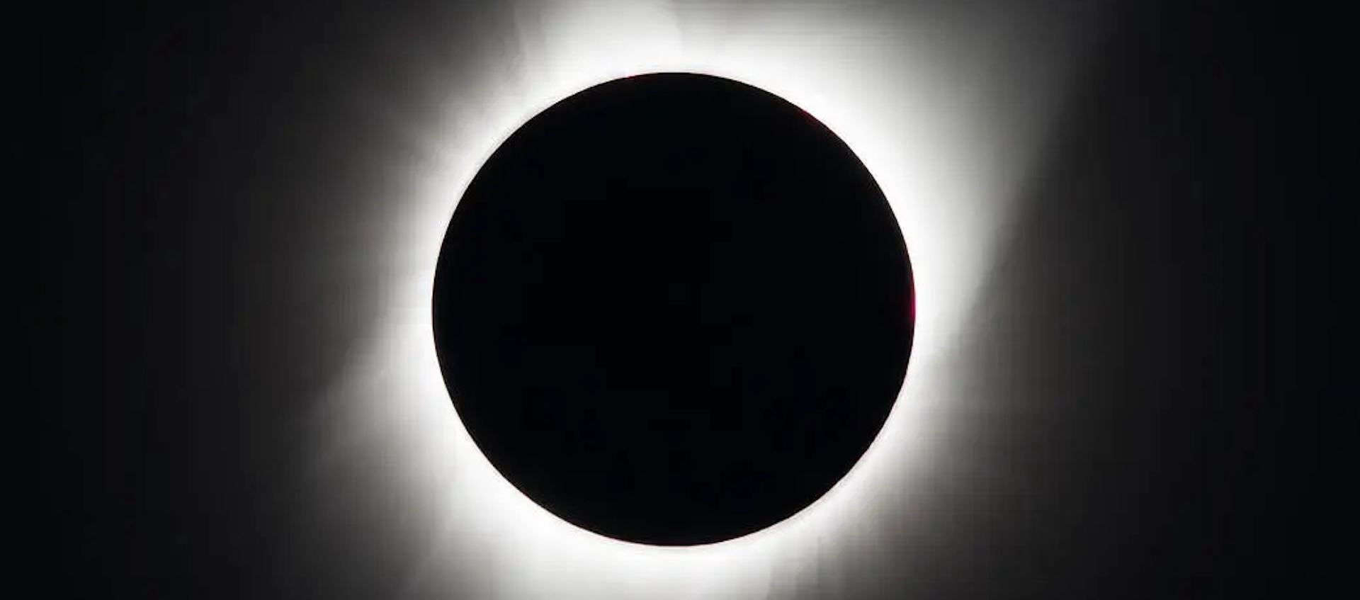 A black and white image of a total solar eclipse.