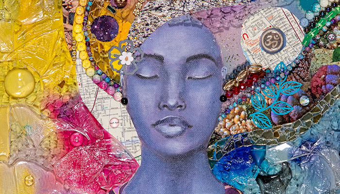 Collage of a face, eyes closed, in blue gray on a colorful background overlaid with glass; image, map, and mirror pieces; shells; plants; and marbles.