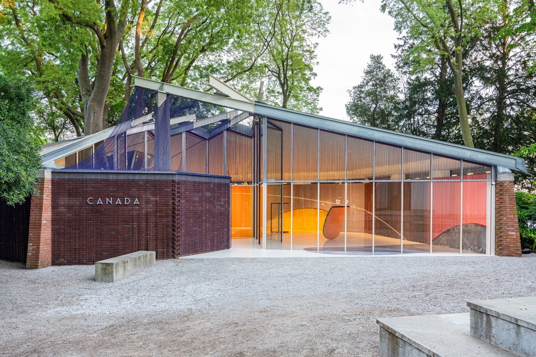 Exterior view of the Canada Pavilion at the Venice Biennale, which is adorned with rows of tiny glass beads.