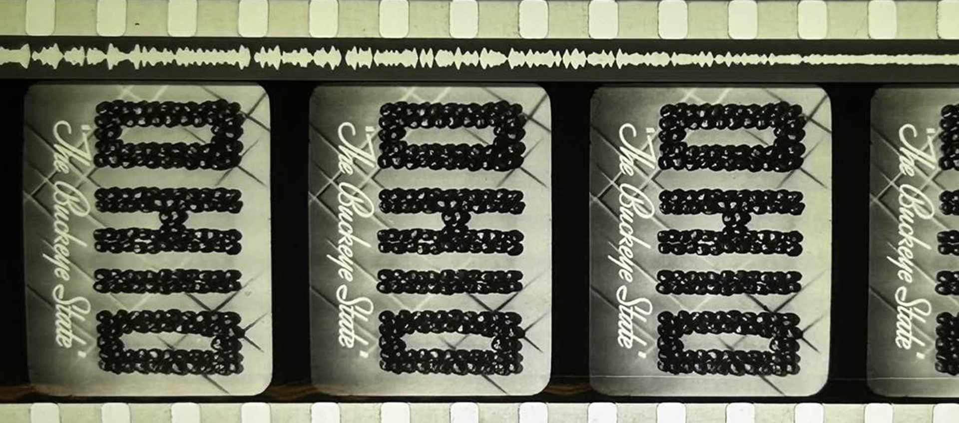 Close up of a film strip with the text "Ohio The Buckeye State."