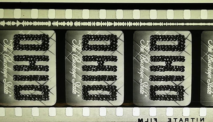 Close up of a film strip with the text "Ohio The Buckeye State."