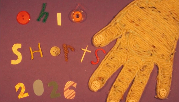 Graphic with a hand made of yarn and yarn, buttons, and cardboard spelling out: Ohio Shorts 2026.